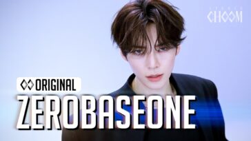 Jovem com cabelo escuro e estiloso, olhando intensamente para a câmera em fundo claro, com texto "ZEROBASEONE".